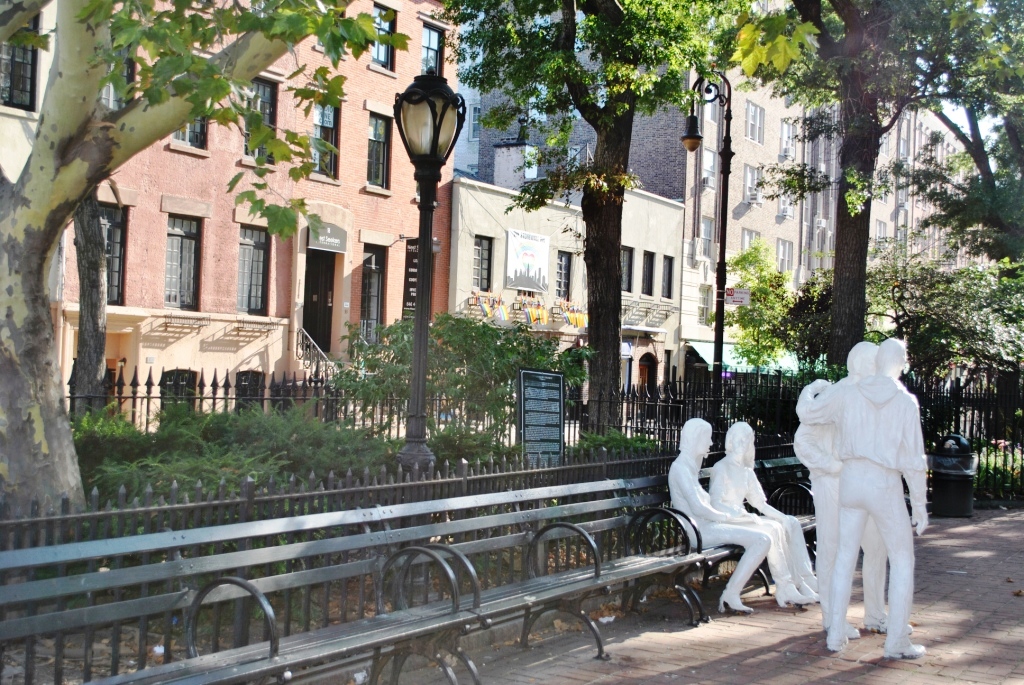 GAY LIBERATION / BY / GEORGE SEGAL / BRONZE CAST - 1980 / DEDICATED - 1992 / --- / GIFT OF THE MILDRED ANDREWS FUND / TO THE CITY OF NEW YORK / Creative Commons Attribution-Share Alike 4.0 Beyond My Ken WikiMedia. https://commons.wikimedia.org/wiki/User_talk:Beyond_My_Ken. https://commons.wikimedia.org/wiki/File:Christopher_Park_(1).JPG